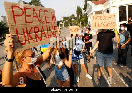 Bangkok, Thailand. 05th Mar, 2022. Protesters hold placards expressing their opinion during the demonstration against war at the Lumphini park in Bangkok. (Photo by Chaiwat Subprasom/SOPA Images/Sipa USA) Credit: Sipa USA/Alamy Live News Stock Photo