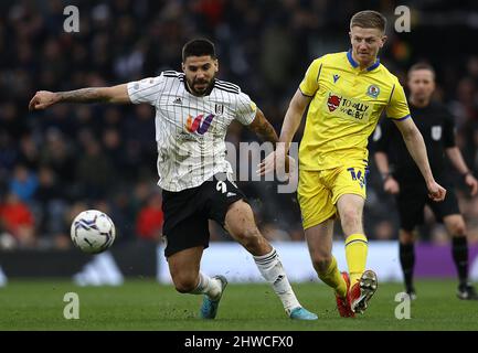 London, England, 5th March 2022. Aleksandar Mitrović of Fulham and Scott Wharton of Blackburn Rovers challenge for the ball during the Sky Bet Championship match at Craven Cottage, London. Picture credit should read: Paul Terry / Sportimage Credit: Sportimage/Alamy Live News Stock Photo