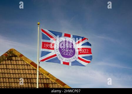 Union Jack flag celebrating the Queens Platinum Jubilee. 1952-2022. Stock Photo