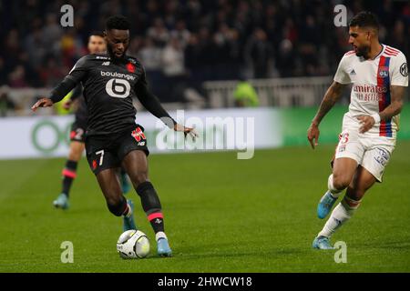Jonathan BAMBA of Lille and EMERSON of Lyon during the French championship Ligue 1 football match between Olympique Lyonnais (Lyon) and LOSC Lille on February 27, 2022 at Groupama stadium in Decines-Charpieu near Lyon, France - Photo Romain Biard / Isports / DPPI Stock Photo