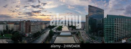 Vienna, Austria - Jul 18, 2021: View of the Danube Canal and Vienna Skyline in Vienna, Austria Stock Photo