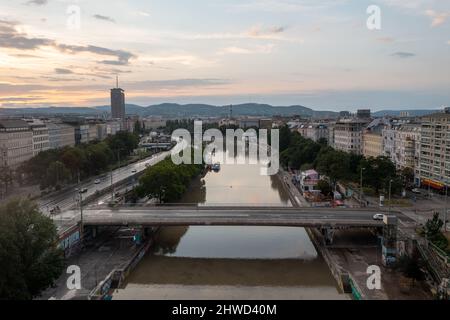 Vienna, Austria - Jul 18, 2021: View of the Danube Canal and Vienna Skyline in Vienna, Austria Stock Photo