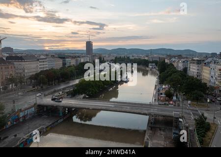 Vienna, Austria - Jul 18, 2021: View of the Danube Canal and Vienna Skyline in Vienna, Austria Stock Photo