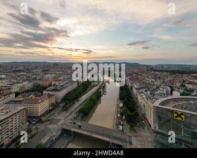 Vienna, Austria - Jul 18, 2021: View of the Danube Canal and Vienna Skyline in Vienna, Austria Stock Photo