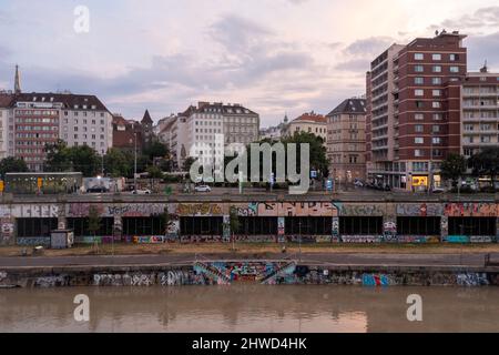 Vienna, Austria - Jul 18, 2021: View of the Danube Canal and Vienna Skyline in Vienna, Austria Stock Photo