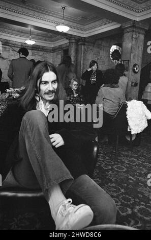 George Harrison at the Midland Hotel in Birmingham, Thursday 4th December 1969. Last night George Harrison performed on stage as part of the Delaney & Bonnie & Friends UK Tour with Eric Clapton at the Town Hall, Birmingham. Stock Photo