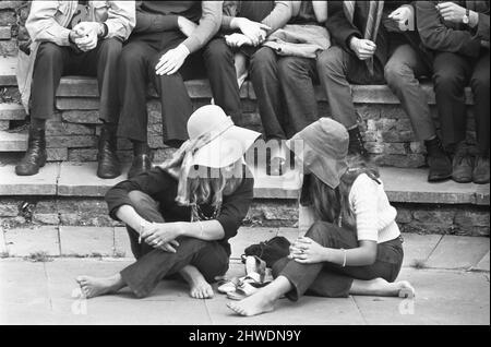 Sixties Fashion 1960s clothing Hippies at flower festival Fur waistcoat ...