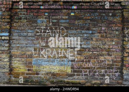 London, UK. 5th Mar, 2022. Ukraine protest at Russian Embassy in Hyde Park. Graffiti on embassy wall. Credit: JOHNNY ARMSTEAD/Alamy Live News Stock Photo