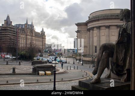 Raphael statue looking over central Liverpool looking to the North Western Hotel and St George's Hall from the Walker Art Gallery, Liverpool UK Stock Photo