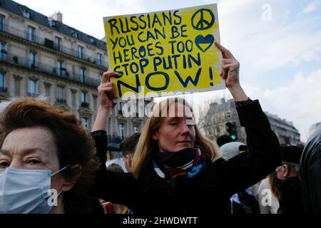 Huge mobilisation in Paris against the war in Ukraine thousands of people marched between the republic and the bastille chanting anti-putin slogans Stock Photo