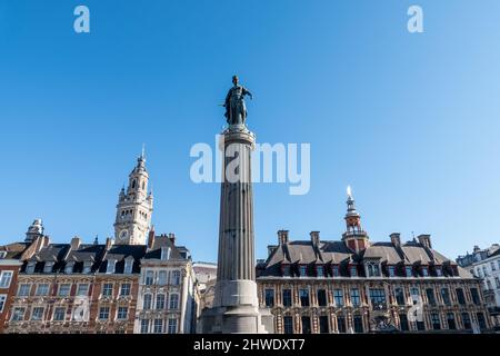 Lille, France, February 28, 2022. Place Charles de Gaulle, Belfry, old stock exchange, column with statue Stock Photo