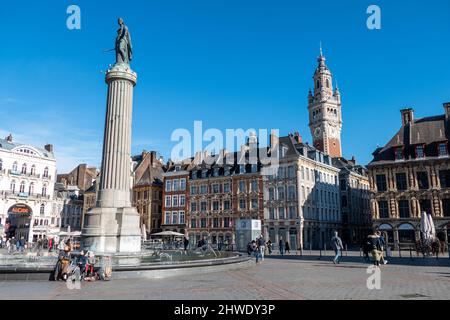 Lille, France, February 28, 2022. Place Charles de Gaulle, Belfry, old stock exchange, column with statue Stock Photo