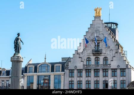 Lille, France, February 28, 2022. Column of Victory, Column of the Goddess with the flags of the La Voix du Nord facade Stock Photo