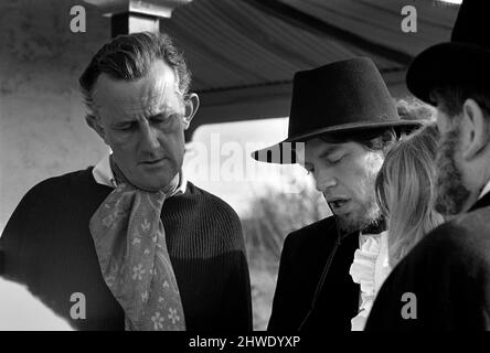 Rolling Stones: Filming Ned Kelly in Australia. Mick Jagger. Tony Richardson and Mick Jagger. July 1969 Stock Photo