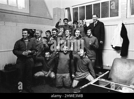 Sheffield Wednesday v Scunthorpe United FA Cup fourth round match at Hillsborough January 1970.   Celebrations in Scunthorpe dressing room with winning goal scorer at back (arm raised in salute)     Final score:  Sheffield Wednesday 1-2 Scunthorpe United Stock Photo