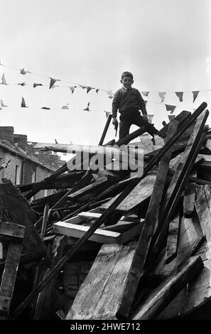 Street party in Balkan Street, Belfast. The party was organised after the street was hit by riot just a week ago after fighting broke out following the army discovering a cache of arms in the road. The party was organised for the children who had to stay in their homes because of a curfew imposed during the riots. 12th July 1970. Stock Photo