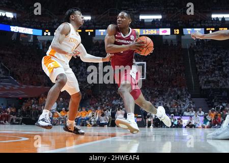 March 5 2022 JD Notae 1 of the Arkansas Razorbacks tries to shoots the ball over Jonas Aidoo 0 of the Tennessee Volunteers during the NCAA basketball game between the University of