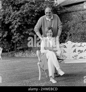 Cliff Mitchelmore and his wife Jean Metcalfe at their home in Reigate, Surrey. In a career spanning some 60 years, Cliff Michelmore anchored coverage of events including the Apollo moon landings and two general elections.  He presented BBC Television show Tonight from 1957 to 1965.  On 4 March 1950 he married Jean Metcalfe, a BBC announcer, who presented Two-Way Family Favourites in London while he was presenting the Hamburg link in the programme for the British Forces Broadcasting Service. The two did not meet face to face for six months, but after meeting they were quickly engaged and marrie Stock Photo