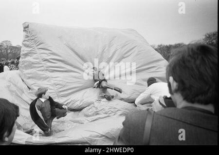 The 'Festival of Life' meeting arranged by the CND held at Victoria Park in Bethnal Green, East London. Picture shows: A giant inflatable igloo being blown up during one of the happenings as some of the youths watching decide to jump on it. 29th March 1970. Stock Photo