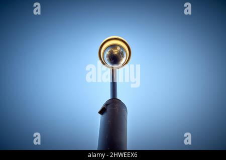 A CCTV Camera looks down menacingly Stock Photo
