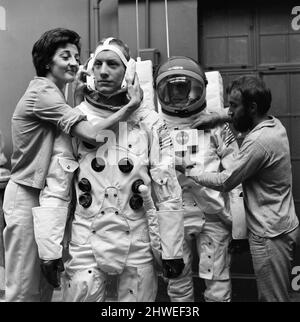 Madame Tussauds staff put the finishing touches to waxwork models of astronauts Neil Armstrong (front) and Buzz Aldrin ahead of display (starting 16th July), to commemorate the anticipated moon landing, Pictured Tuesday 15th July 1969. Our Picture Shows ... sculptor Jean Fraser assisted by David Tomkins. Stock Photo