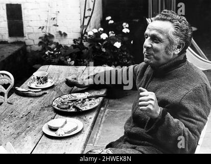 Leo Abse, MP for Pontypool, having breakfast in the garden of his home in London. 16th July 1969. Stock Photo