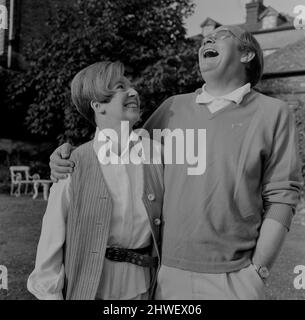 Cliff Mitchelmore and his wife Jean Metcalfe at their home in Reigate, Surrey. In a career spanning some 60 years, Cliff Michelmore anchored coverage of events including the Apollo moon landings and two general elections.  He presented BBC Television show Tonight from 1957 to 1965.  On 4 March 1950 he married Jean Metcalfe, a BBC announcer, who presented Two-Way Family Favourites in London while he was presenting the Hamburg link in the programme for the British Forces Broadcasting Service. The two did not meet face to face for six months, but after meeting they were quickly engaged and marrie Stock Photo