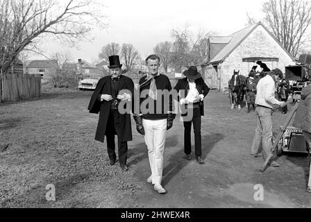 Rolling Stones: Filming Ned Kelly in Australia. Mick Jagger. Director, Tony Richardson, talks to Tony Bazell on the set. July 1969 Stock Photo