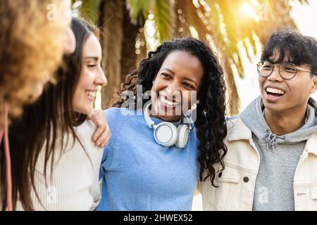 Group of happy millennial friends laughing together Stock Photo