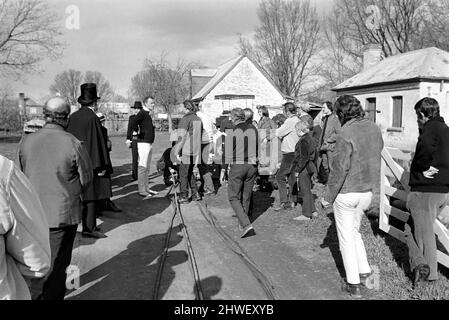 Rolling Stones: Filming Ned Kelly in Australia. Mick Jagger. Richardson talks to camera team. July 1969 Stock Photo