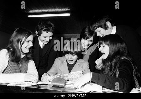 16 year old actor Jack Wild who played the role of the Artful Dodger in the 1968 Lionel Bart musical film Oliver! Pictured visiting his schoolmates at the Barbara Speake Drama School, opening some fan mail. East Acton, London. 27th March 1969. Stock Photo