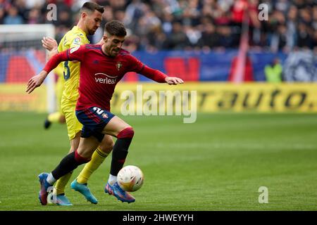 Pamplona, Spain. 05th Mar, 2022. Nacho Vidal (defender; CA Osasuna) and Moi Gómez (midfielder; Villarreal CF) in action during the Spanish La Liga Santander football match between CA Osasuna and Villrreal CF at the Sadar Stadium.(CA Osasuna won: 1 - 0) (Photo by Fernando Pidal/SOPA Images/Sipa USA) Credit: Sipa USA/Alamy Live News Stock Photo