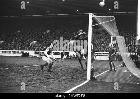 Sheffield Wednesday v Scunthorpe United FA Cup fourth round match at Hillsborough January 1970.   Scunthorpe's goalkeeper Geoff Barnard puts ball over bar    Final score:  Sheffield Wednesday 1-2 Scunthorpe United Stock Photo