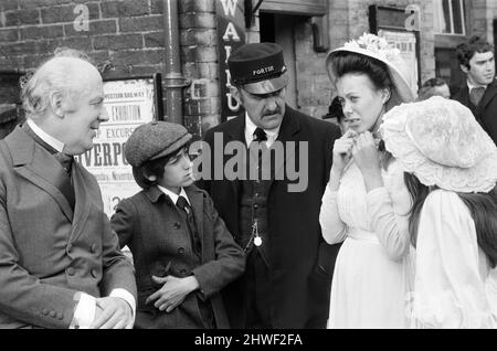William Mervyn, Gary Warren, Bernard Cribbins and Jenny Agutter on the set of 'The Railway Children' at Oakworth, West Yorkshire. 20th May 1970. Stock Photo