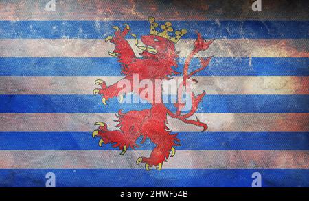 Top view of retro flag Official Province of Luxembourg, Belgium with grunge texture. Belgian travel and patriot concept. no flagpole. Plane layout, de Stock Photo