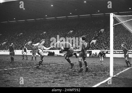 Sheffield Wednesday v Scunthorpe United FA Cup fourth round match at Hillsborough January 1970.   Scunthorpe goalkeeper Geoff Barnard saves attempt from Wednesday's Jack Whitham    Final score:  Sheffield Wednesday 1-2 Scunthorpe United Stock Photo