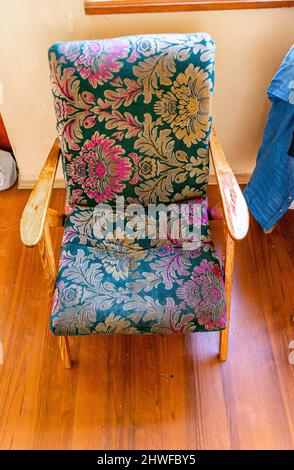 Old worn armchair furniture, Soviet manufactured Stock Photo