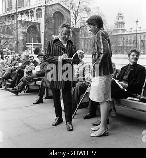 Leo Abse, Labour MP for Pontypool, arrives at the House of Commons wearing his budget day clothes, a suit made of Welsh tweed. Pictured signing an autograph for 17 year old Susan Kerwick of Rugby who is a collector of political autographs. 15th April 1969. Stock Photo