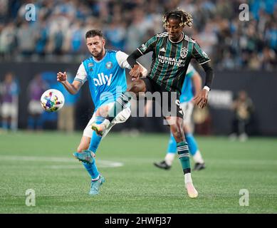 , North Carolina, USA. 5th March, 2022. Los Angeles Galaxy forward Kevin Cabral (9) battles for possession with Charlotte FC midfielder Brandt Bronico (13) during an MLS soccer match between the Los Angeles Galaxy and the Charlotte FC on Saturday, March 05, 2022 at Bank of America Stadium in Charlotte, North Carolina. Rusty Jones/Cal Sport Media Stock Photo