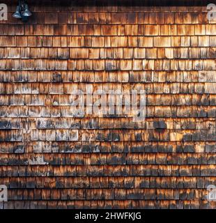Details of a rustic farmstead barn. Siding with weathered wooden shingles. Minute Man National Historical Park, Lexington, Massachusetts Stock Photo