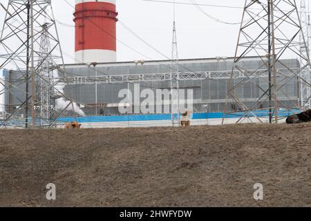 RUSSIA, MOSCOW - MAR 05, 2022: power industrial plant landscape energy, for environment smoke for global for vapor steam, dust danger. High blue Stock Photo