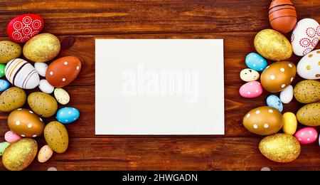 Easter eggs on wooden background . Wooden background. The minimal concept. Top view. Card with a copy of the place for the text. Stock Photo