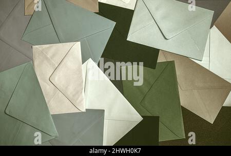 Different colored envelopes on the table Stock Photo