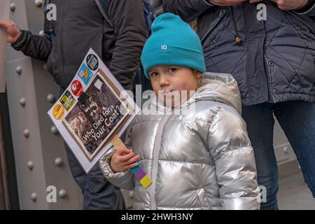 New York, United States. 05th Mar, 2022. Mya, age 3, holds a sign in front of the Dior store in SOHO during an Anti-Fur Protest on March 5, 2022 in New York City. Animal rights activists hold a peaceful NYC's Anti-Fur Protest protesting Dior, Fendi and Louis Vuitton for refusing to go fur free. (Photo by Ron Adar/SOPA Images/Sipa USA) Credit: Sipa USA/Alamy Live News Stock Photo