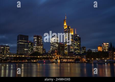 Frankfurt Am Main, Germany. 06th Mar, 2022. The skyline of Frankfurt am Main at night, March 6, 2022. The skyscrapers are brightly lit. On the right, the Commerzbank Tower, the headquarters of Commerzbank. (Photo by Alexander Pohl/Sipa USA) Credit: Sipa USA/Alamy Live News Stock Photo