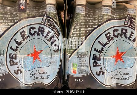 Liege, Belgium - March 3. 2022: Closeup of plastic bottles with logo lettering of s. pellegrino minaeral water Stock Photo