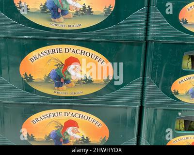 Liege, Belgium - March 3. 2022: Closeup of stacked beer crates with logo lettering of belgian beer brand achuffe Stock Photo