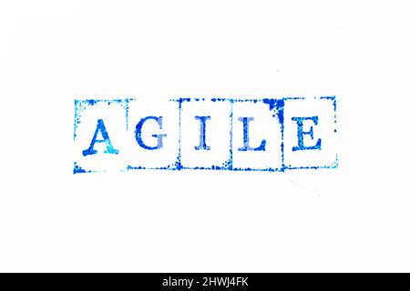 Blue color ink rubber stamp in word agile on white paper background Stock Photo