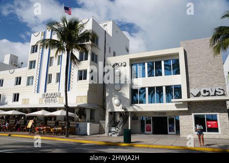 South Beach, Miami, Florida, U.S.A - February 18, 2022 - The Beacon Hotel and CVS convenient store on Ocean Drive Stock Photo