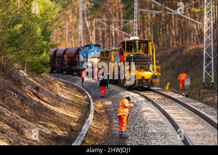 Various machines are used for track construction work Stock Photo